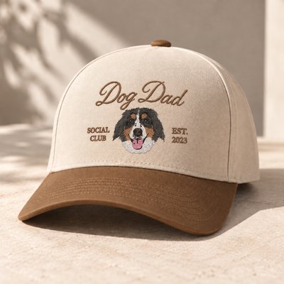 Custom Dog Dad snapback hat embroidered with a Bernese mountain dog portrait, cream with brown brim